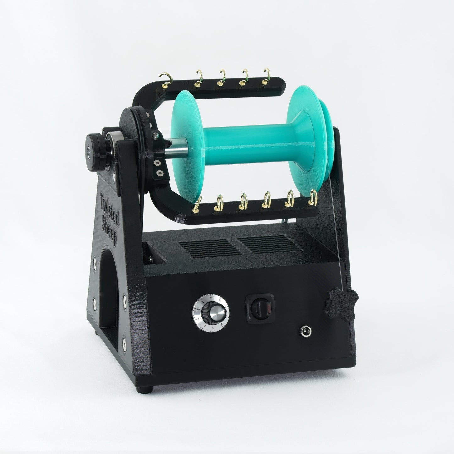 Twisted Sheep portable electric spinning wheel with mint green bobbin