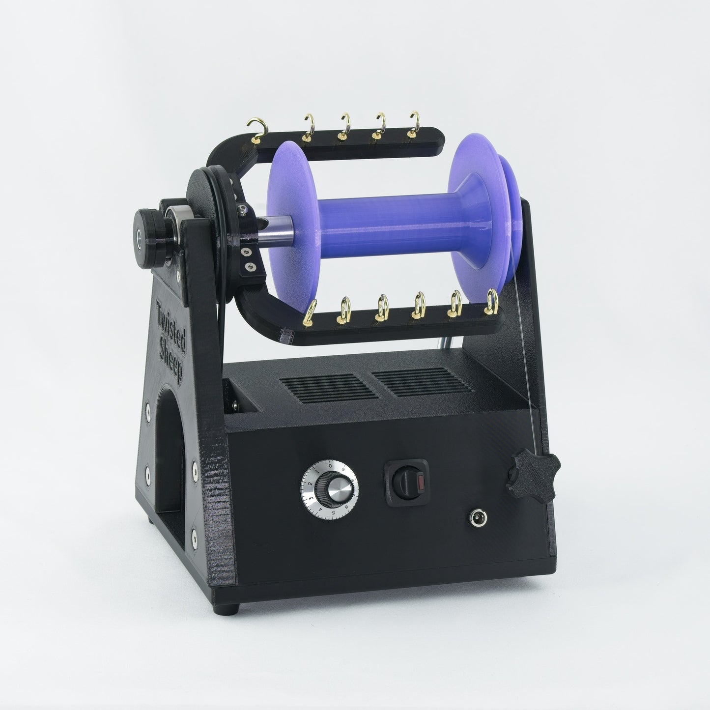 Twisted Sheep portable electric spinning wheel with purple bobbin
